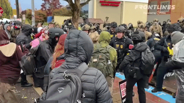 protesters-clash-with-federal-agents-in-portland.gif