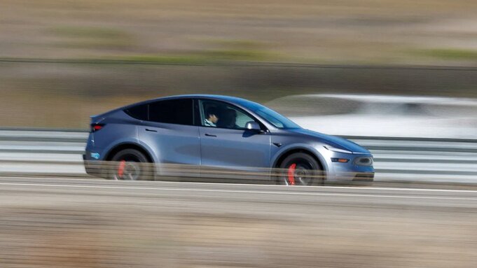 tesla-vehicle-on-highway.jpg