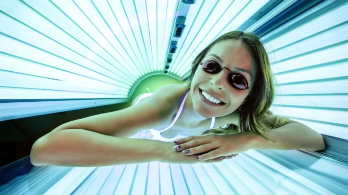 woman-smiling-indoor-tanning-bed.webp.webp