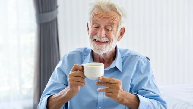 happy-elderly-man-tea.webp.webp
