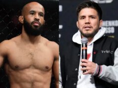 德米特里厄斯·約翰遜阻止了亨利·塞胡多推動英國皇家空軍摔跤比賽