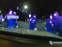 影片顯示警察被困在巡洋艦內。當犯罪者打碎汽車的擋風玻璃時