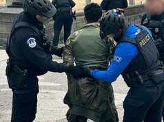 一名喬治亞州男子攜帶上膛的獵槍跑到國會大廈後被捕。