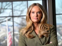 國土安全部為麥克勞克林辯護,聲稱她丈夫的公司從廣告中獲利數百萬美元。