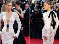 貝拉哈蒂德 (Bella Hadid) 在坎城影展上穿著 Schiaparelli 深V禮服。