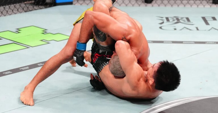 宋亞東在UFC澳門主賽中用斷頭台絞殺戴維森·菲格雷多