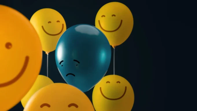 happy-and-sad-balloon-faces-depression.webp