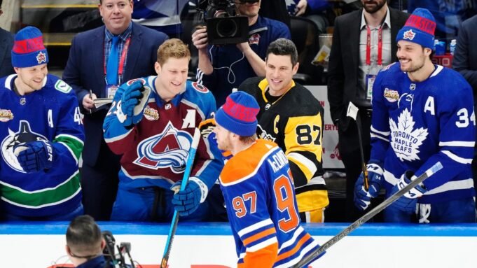 Edmonton-Oilers-Connor-McDavid-is-congratulated-by-Vancouver-Canucks-Elias-Pettersson-left-to-right.jpeg