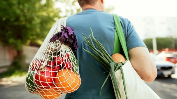 man_carrying_produce.jpeg