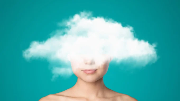 woman-brain-fog-head-in-cloud.webp