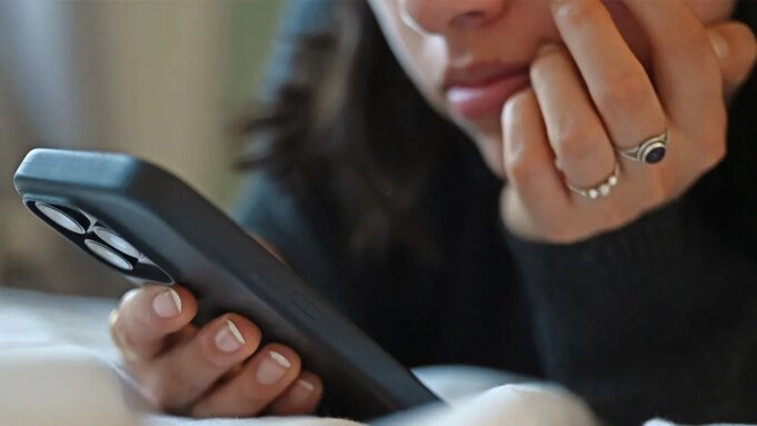 young-woman-staring-at-smartphone.jpeg